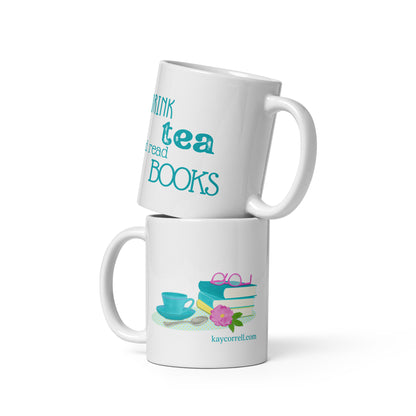 White mug with I drink tea and read books. Illustration on other side